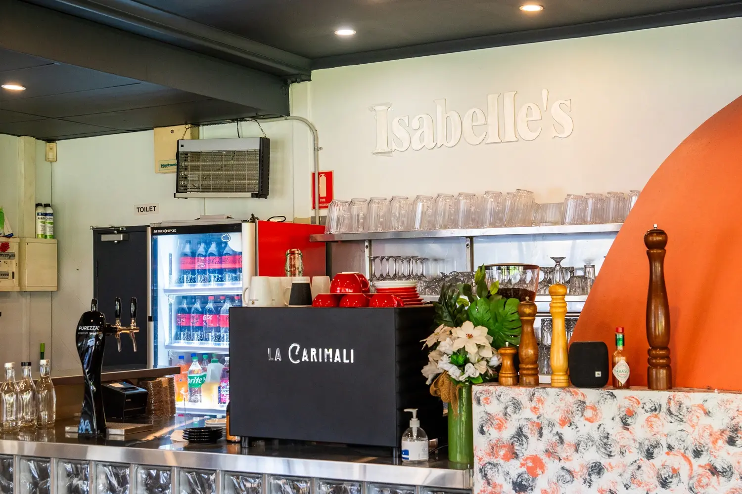 Isabelle’s-Pizzeria-counter.webp